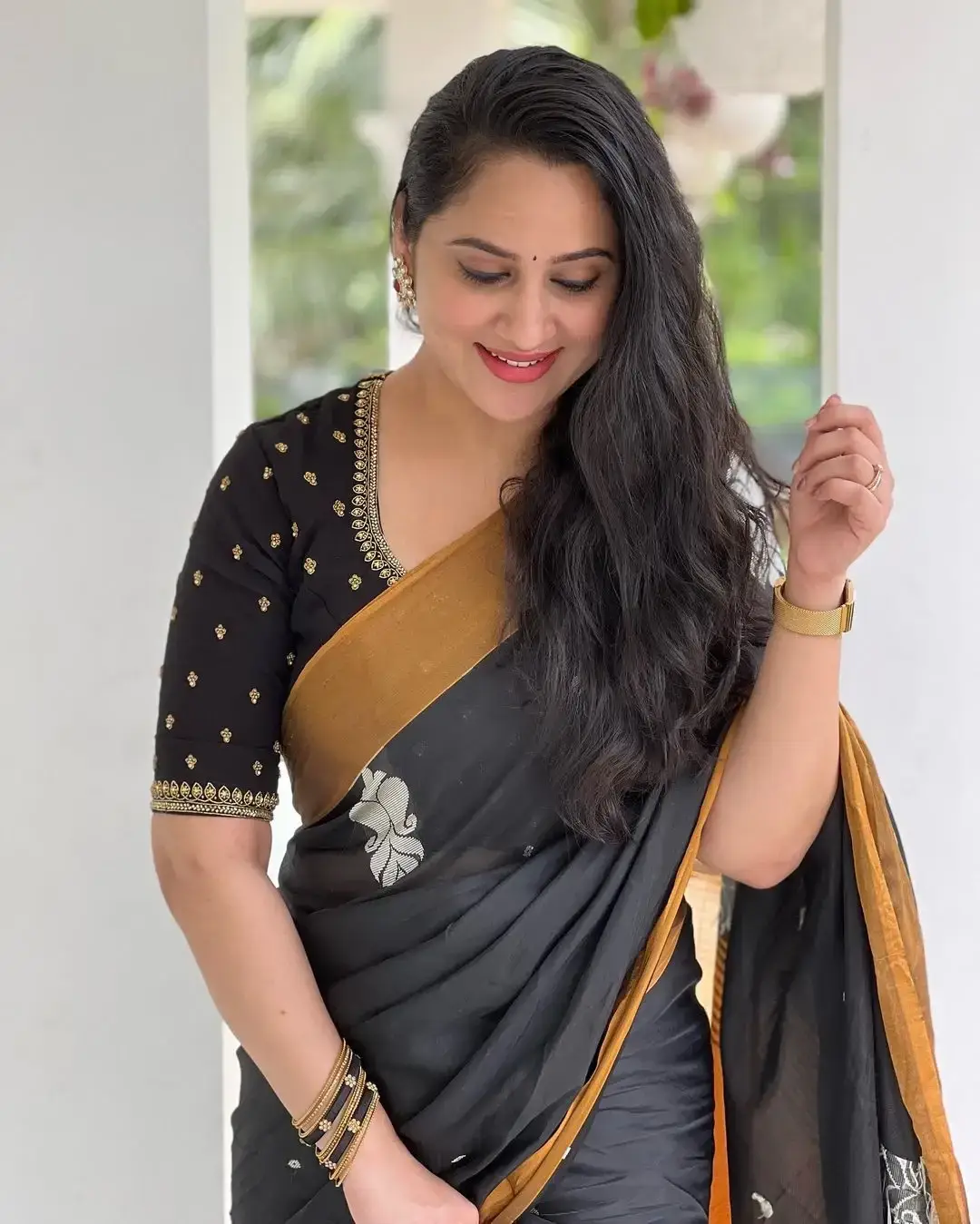 Beautiful Indian Queen Miya George in Traditional black Saree